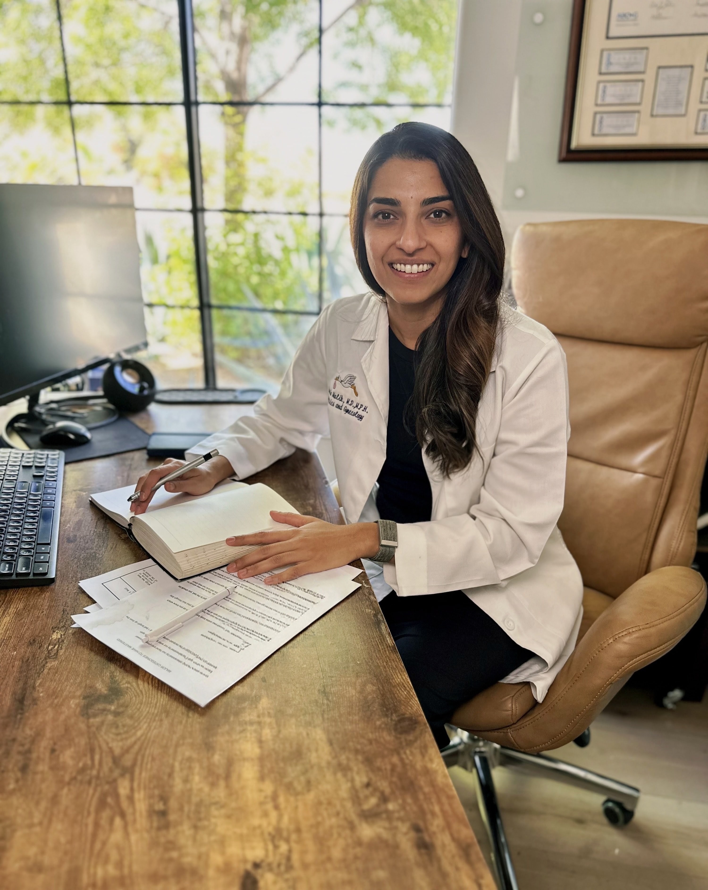Dr. Yusria Malik, MD, MPH, FACOG — board-certified OB-GYN expert witness